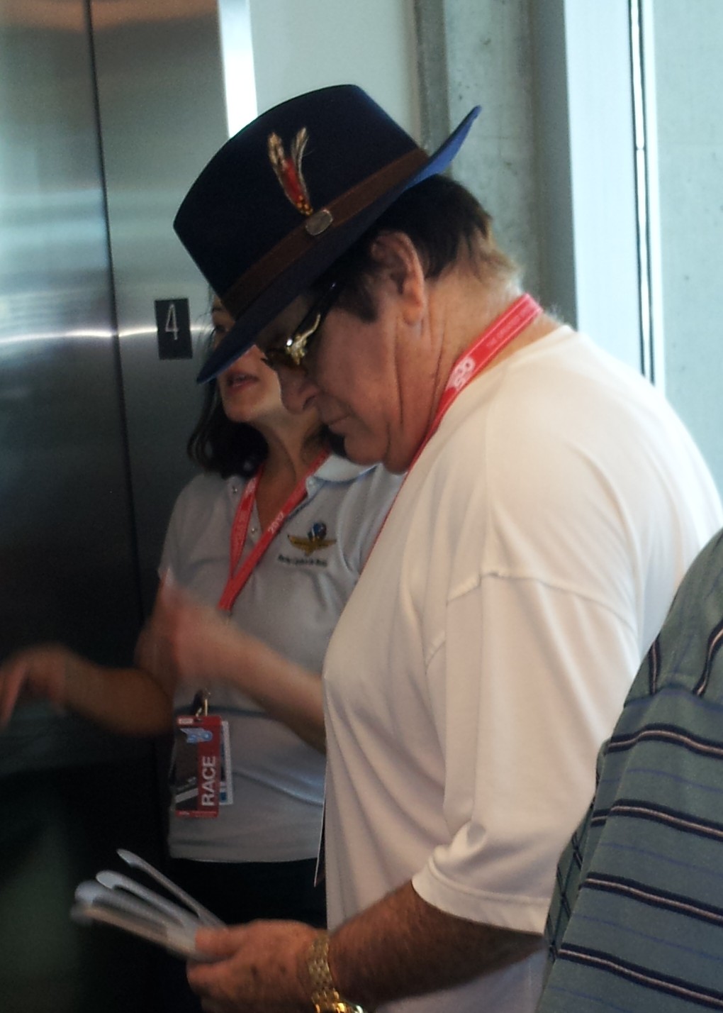 Pete Rose attends the Indianapolis 500. He's seen here waiting to enter the media center elevator.