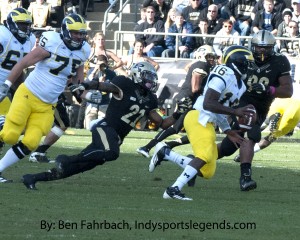 Michigan still has high hopes, even though Denard Robinson (16), one of the great running quarterbacks in college football history, is gone.