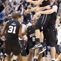 Andrew Smith lifts Alex Barlow up in the air as Butler celebrates an overtime win at Bankers Life Fieldhouse.