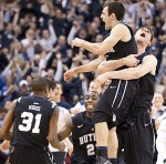 Andrew Smith lifts Alex Barlow up in the air as Butler celebrates an overtime win at Bankers Life Fieldhouse.