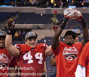Wisconsin's Chris Borland, left, and Montee Ball, right, with the Big Ten championship trophy they won after rolling past Nebraska 70-31 last season.
