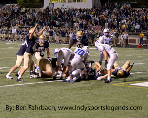 Cathedral's Collin Barthel scores the game-winning touchdown against Cathedral last week.