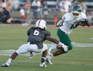 Lawrence Central cornerback Demetreeus Loper (6) gets in position to make a play against Louisville Trinity. Photo by Justin Whitaker.