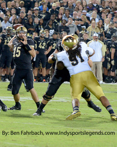 Purdue's Rob Henry (15) throws against Notre Dame.