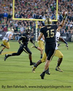 Purdue quarterback Rob Henry (15) throws on the run against Notre Dame.