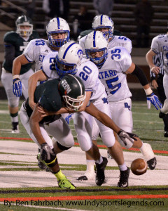 Chatard cornerback Peter Treesh forces a fumble against Indianapolis Tech.