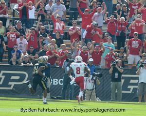 Nebraska running back Ameer Abdullah runs towards a large contingent of Nebraska fans on Saturday.