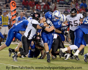 Chatard's Alex Kimack runs against North Central.