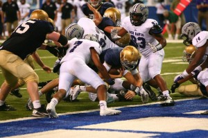 Collin Barthel, shown here on the sneak against Ben Davis, was nearly flawless against Whiteland.