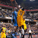 Orlando rookie Victor Oladipo gets his shot blocked by Indiana's Ian Mahinmi. Jessica Hoffman/Pacers 