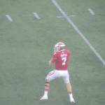 Nate Sudfeld drops back to pass in the first half against Illinois. (Photo by Chris Goff.)