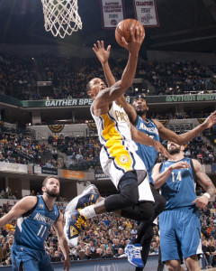 George Hill (3) drives through traffic. He scored 26 points to lead the Pacers past Minnesota. Photo by Jessica Hoffman, Pacers Sports and Entertainment.
