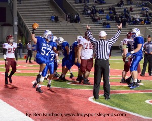 Chatard's Michael Annee celebrates after recovering a blocked punt in the end zone for a touchdown.