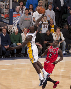 Indiana's Lance Stephenson throws it down as Chicago's Luol Deng watches. Photo by Frank McGrath. Pacers Sports and Entertainment.