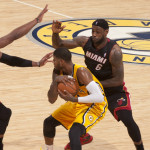 Dwyane Wade, left, and LeBron James, right, swarm Pacers forward Paul George. Photo by Frank McGrath, Pacers Sports and Entertainment.