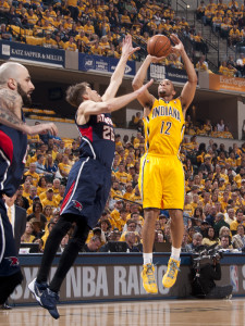 Indiana's Evan Turner shoots over Atlanta's Kyle Korver in Game 1. Photo by Pacers Sports and Entertainment.
