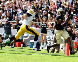 Purdue's Frankiw Williams returns an interception for a touchdown against Iowa. Photo by Ben Fahrbach.