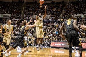 Rapheal Davis launches a 3-pointer against Iowa. Photo by Purdue Athletics.