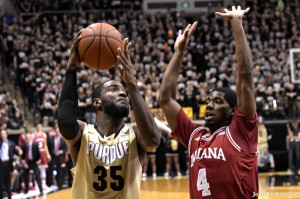 Rapheal Davis, 35, shoots against Indiana's Robert Johnson. Photo by Purdue Athletics.