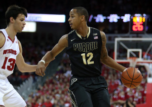 Purdue's Vince Edwards handles the ball during a loss to Wisconsin. From Purdue Athletics.