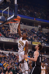 Ian Mahinmi slams one home against the Nets. (Photo by Pacers Sports and Entertainment)