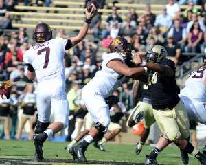 Minnesota quarterback Mitch Leidner looks for a receiver. Photo by Ben Fahrbach.