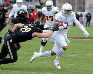 Indiana's Simmie Cobbs, Jr., tries to evade Purdue's Jimmy Herman. Photo by Ben Fahrbach.