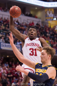 Thomas Bryant soars over a Michigan defender. (Photo by Jamie Owens)