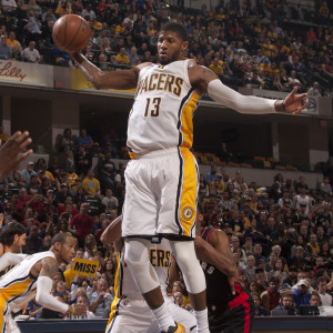 Paul George skies for a rebound against the Raptors.  (Photo by Pacers Sports and Entertainment)