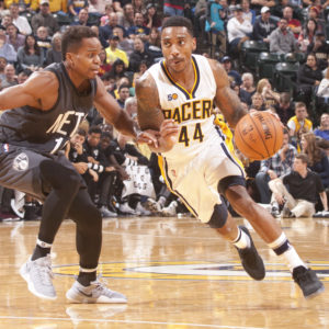 Jeff Teague drives on Yogi Ferrell. Teague had 9 points, 9 rebounds, and 8 assists in the Pacers win. (Photo by Pacers sports and entertainment)
