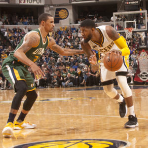 Paul George drives on former teammate George Hill. (Photo by Pacers Sports and Entertainment)