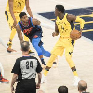 Victor Oladipo and Paul George do battle in George's return to Indianapolis.  (Photo by Pacers Sports and Entertainment)